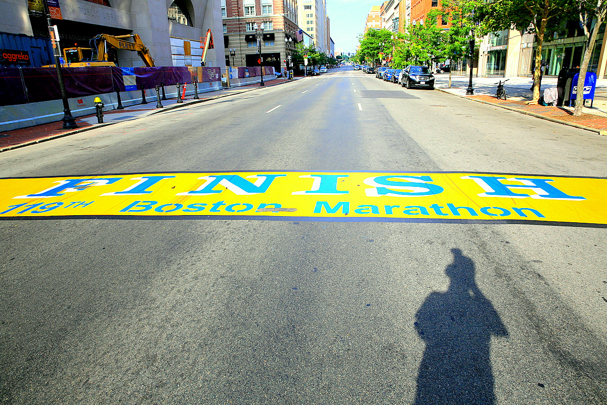The painted Boston Marathon finish line on Boylston Street near Copley Square.
