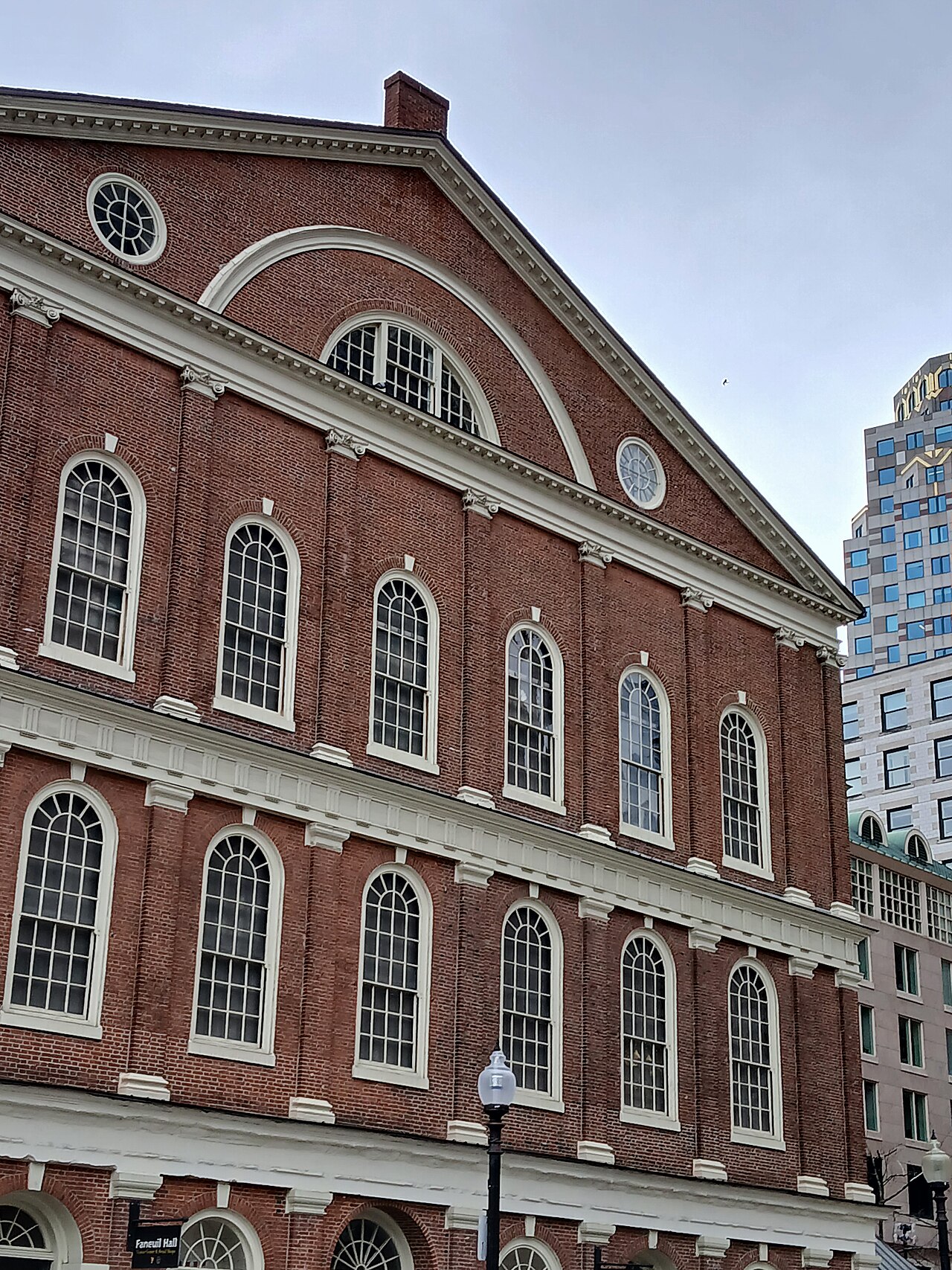 Faneuil Hall, the brick colonial meeting house and marketplace in downtown Boston.